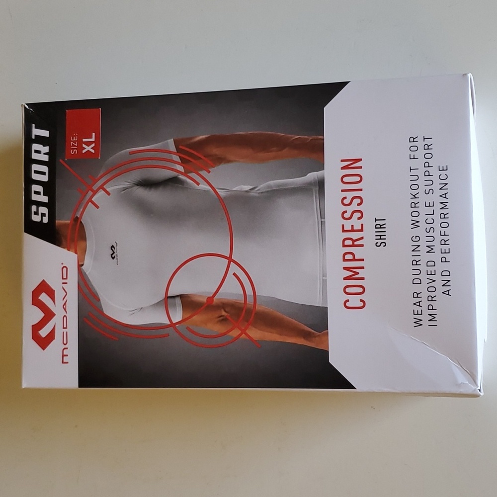 MCDAVID compression shirt. Brand New. Size XL